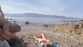 A Daring Exhibitionist Reveals His Penis To A Nudist Mature Woman Who Performs Oral Sex On Him At The Beach